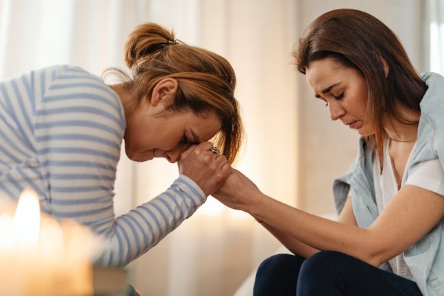 Mother and daughter sharing a heartfelt moment, supporting each other through emotional times.